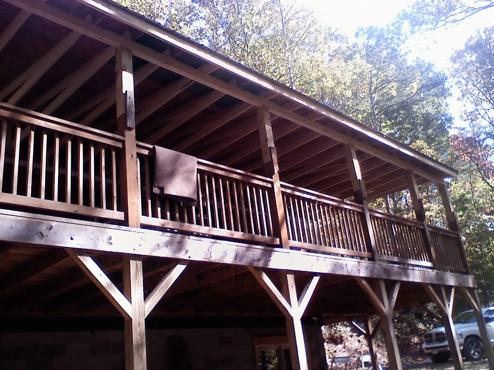 Timber framing under a new elevated porch and deck — Roof Leak Repair in Amesbury by Roofing Brothers